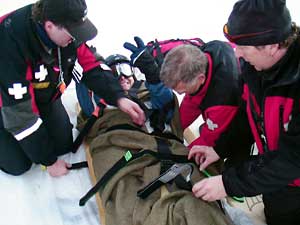 Mike Henness with ski patrol in Sun Peaks, Canada, 2005.