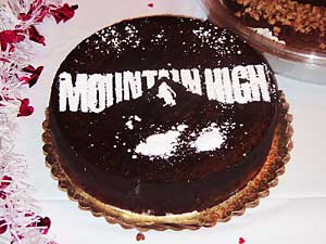 Mountain High logo chocolate cake