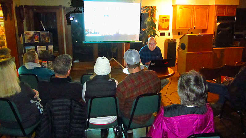 Lloyd operates the projector