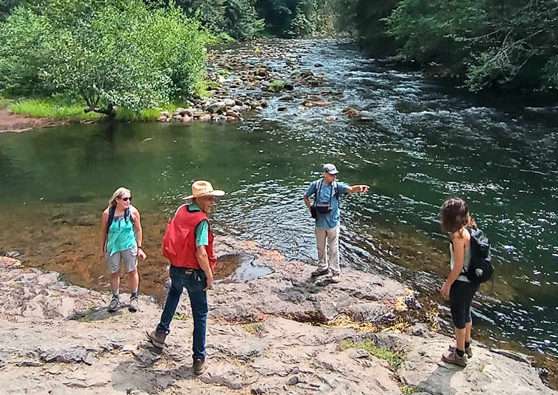 By the river