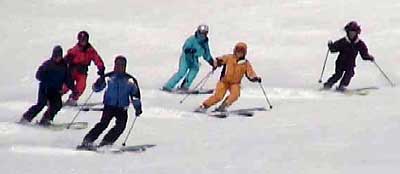 Synchronized skiing practice, Mt. High club members, Big Mountain, MT.